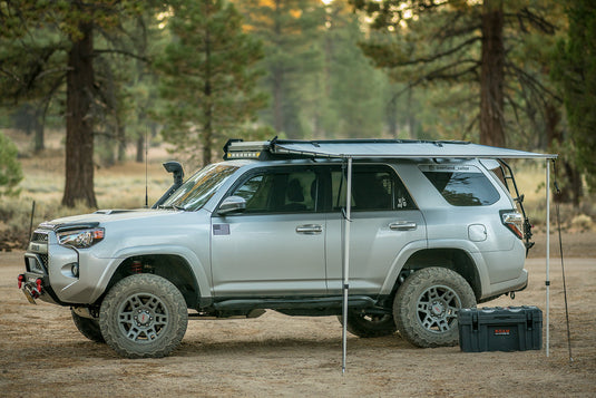 ROAM Adventure Co. Rooftop Awning connected to roof rails of a Toyota 4Runner